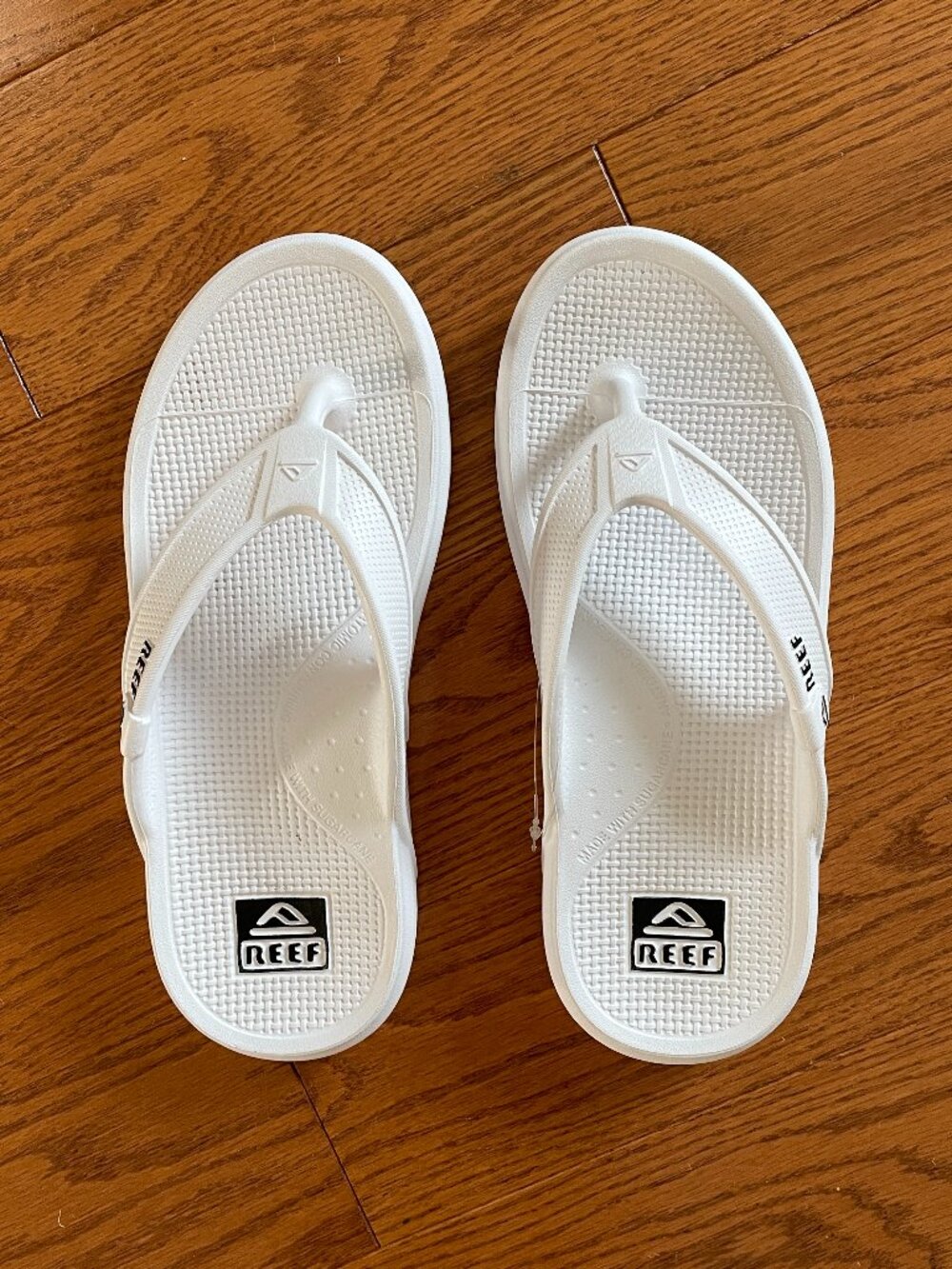 Brand new REEF men's flip flops